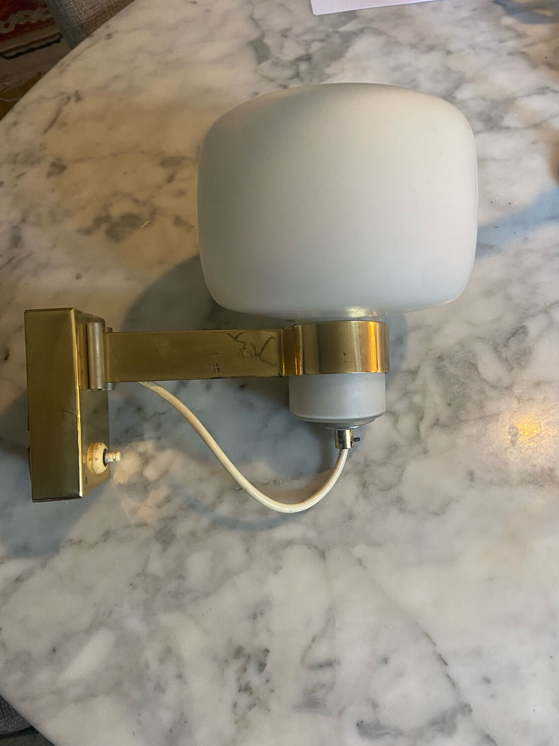 Vintage opaline and brass wall lamp