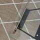 Metal and glass coffee table with magazine rack by Roche Bobois from the 1950s.