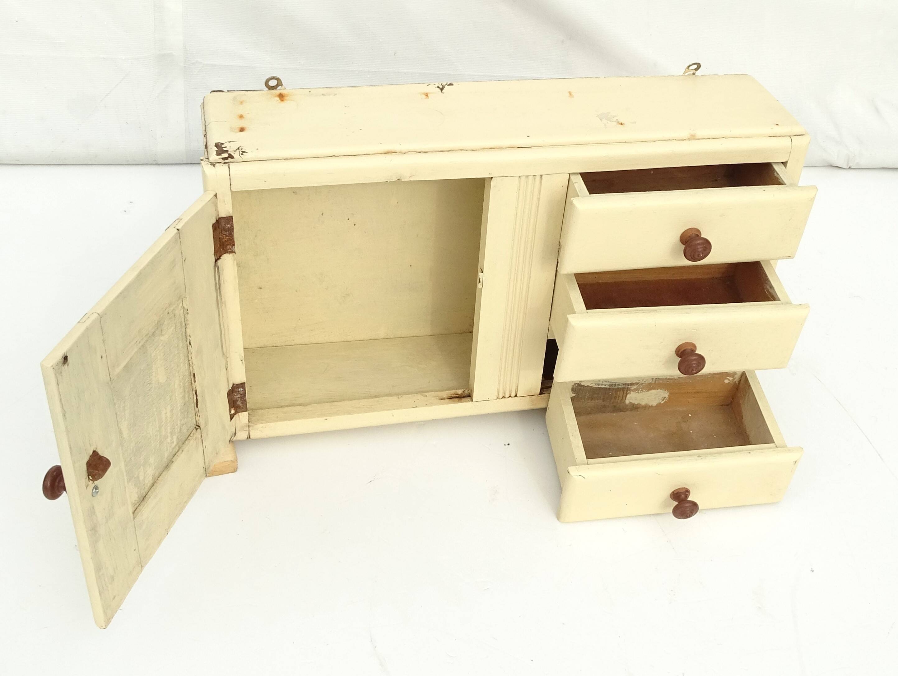 Small vintage wooden wall cupboard.