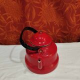 red enamelled sheet metal kettle