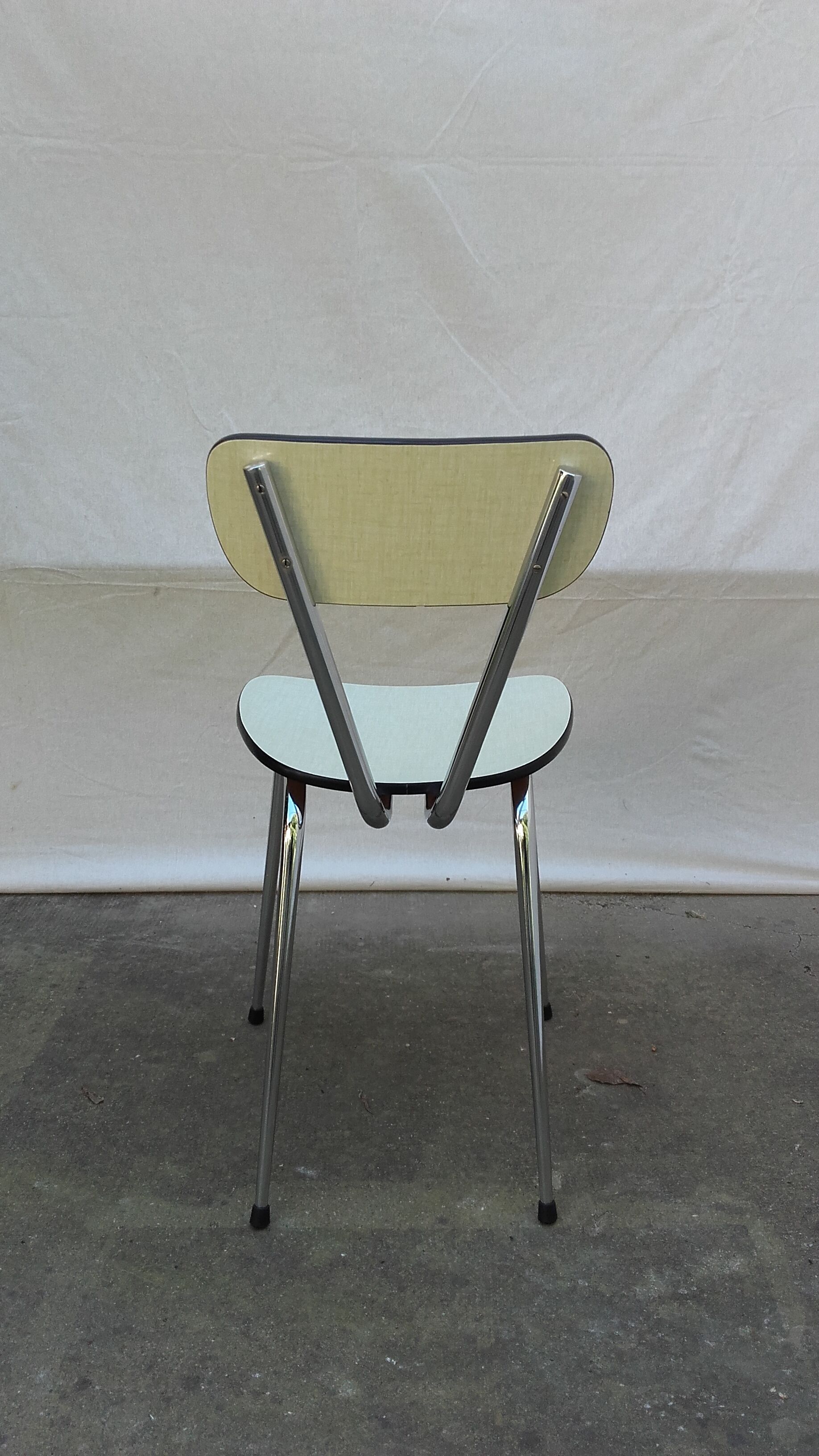 Six ivory formica chairs
