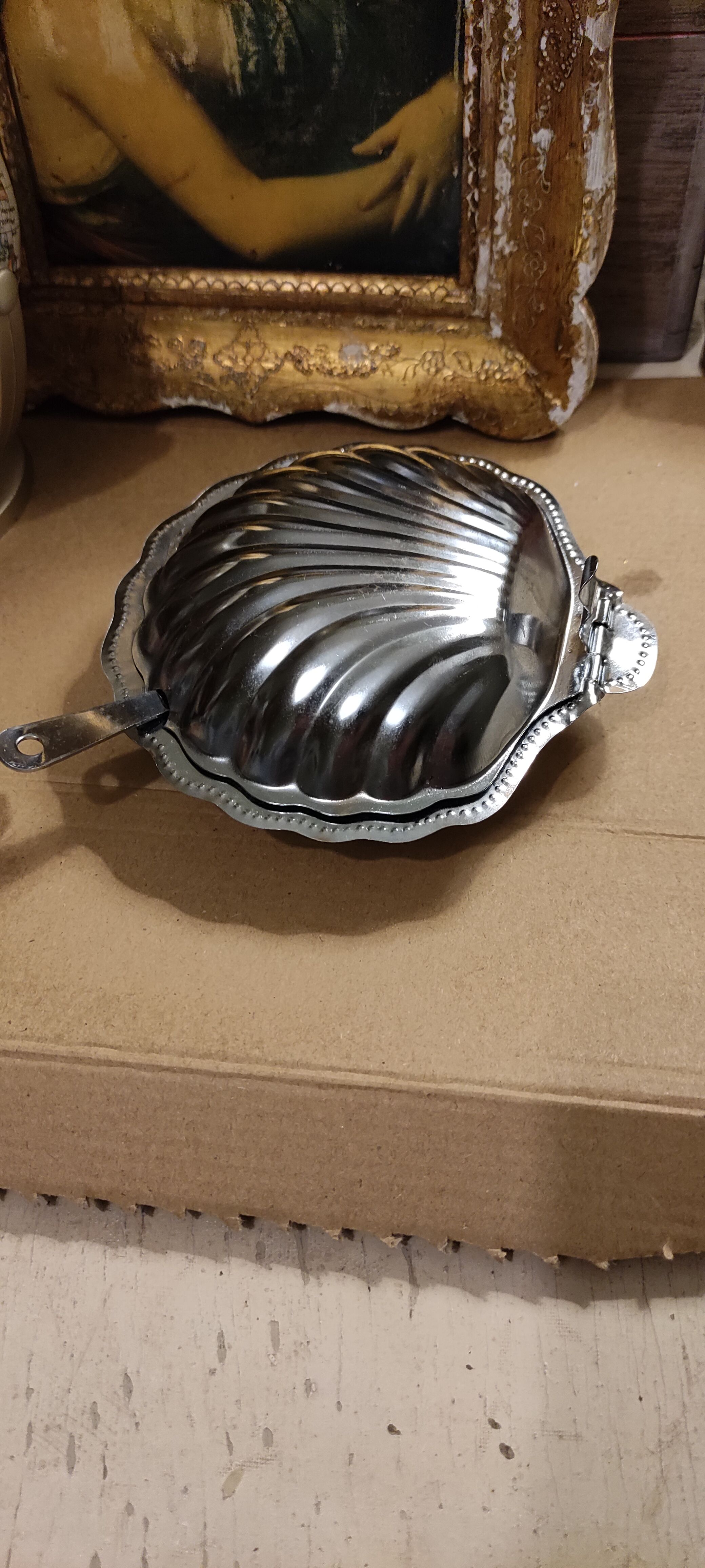 Vintage silver metal butter in shell shape