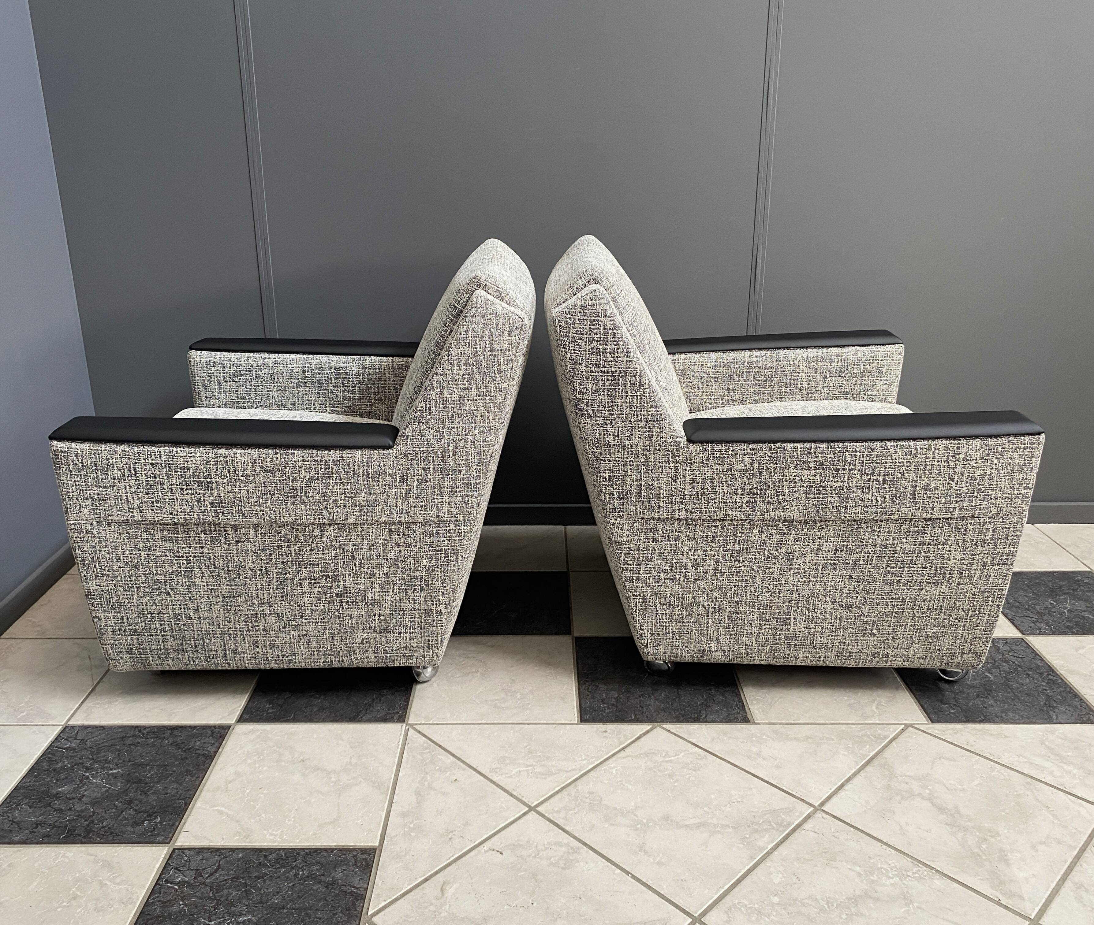 set of 2 grey relax chairs on castors 1970s