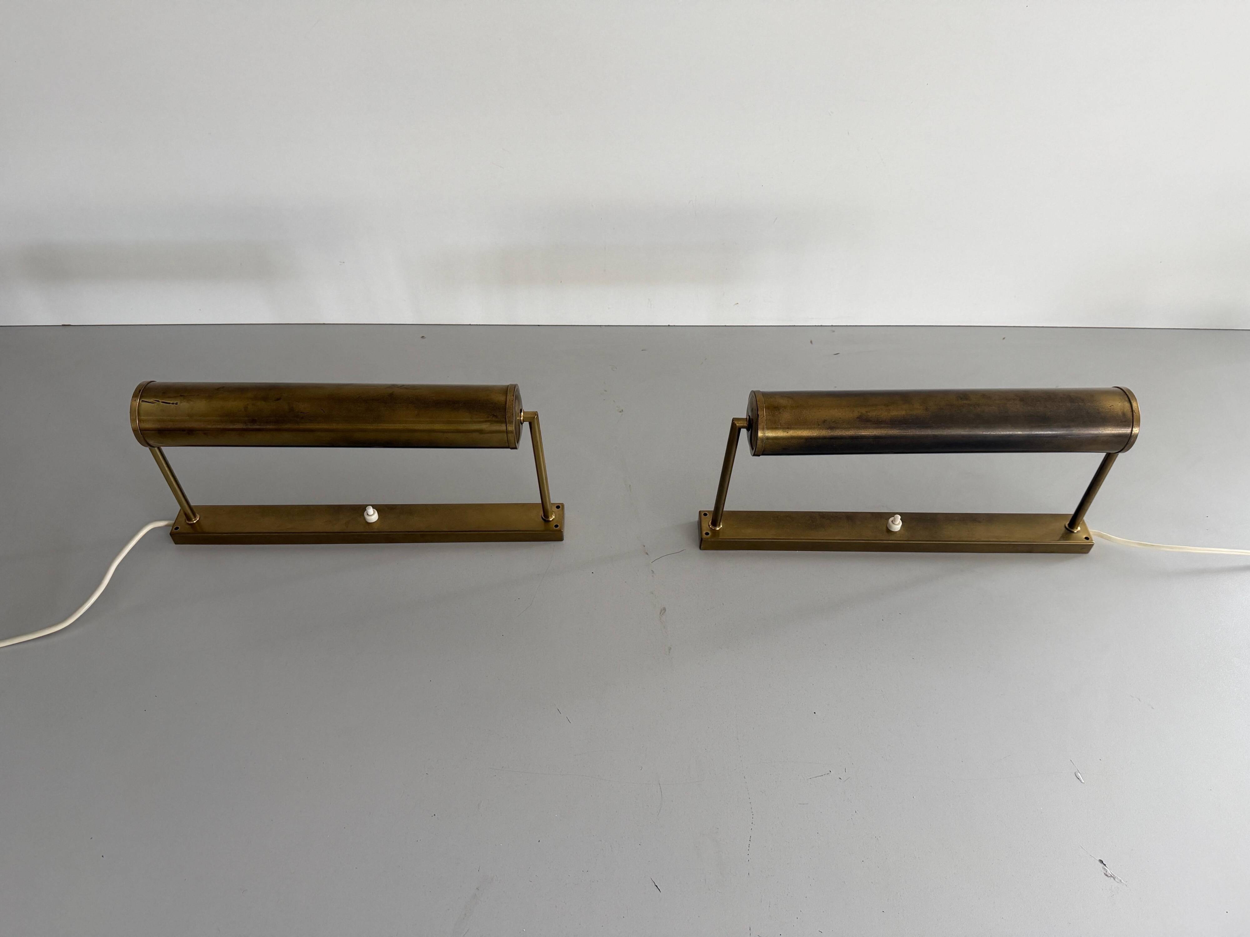 Pair of brass wall lights with adjustable heads from the mid-20th century, 1960, Germany.