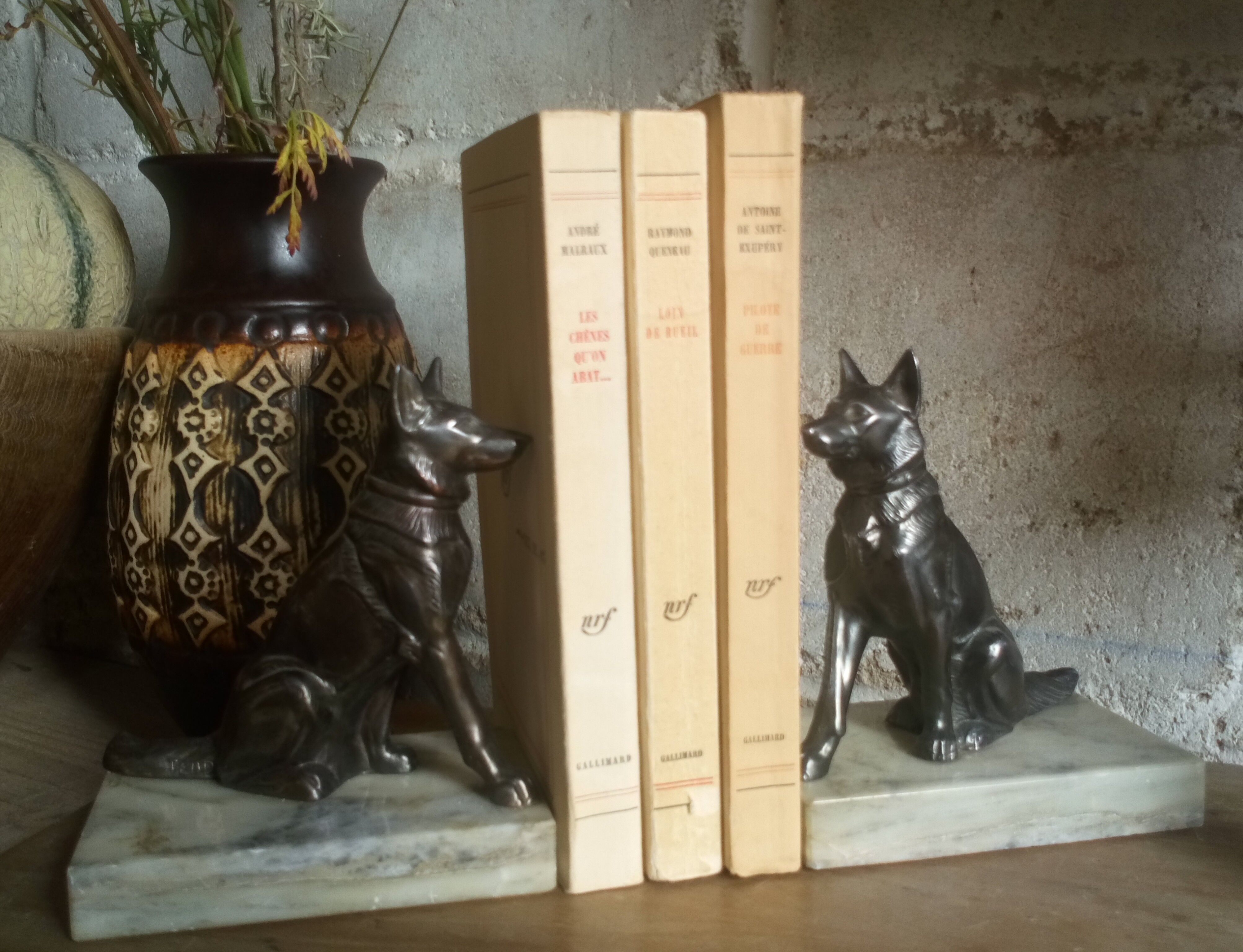 Pair of Art Deco bookends to signed wolf dogs