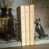 Pair of Art Deco bookends to signed wolf dogs