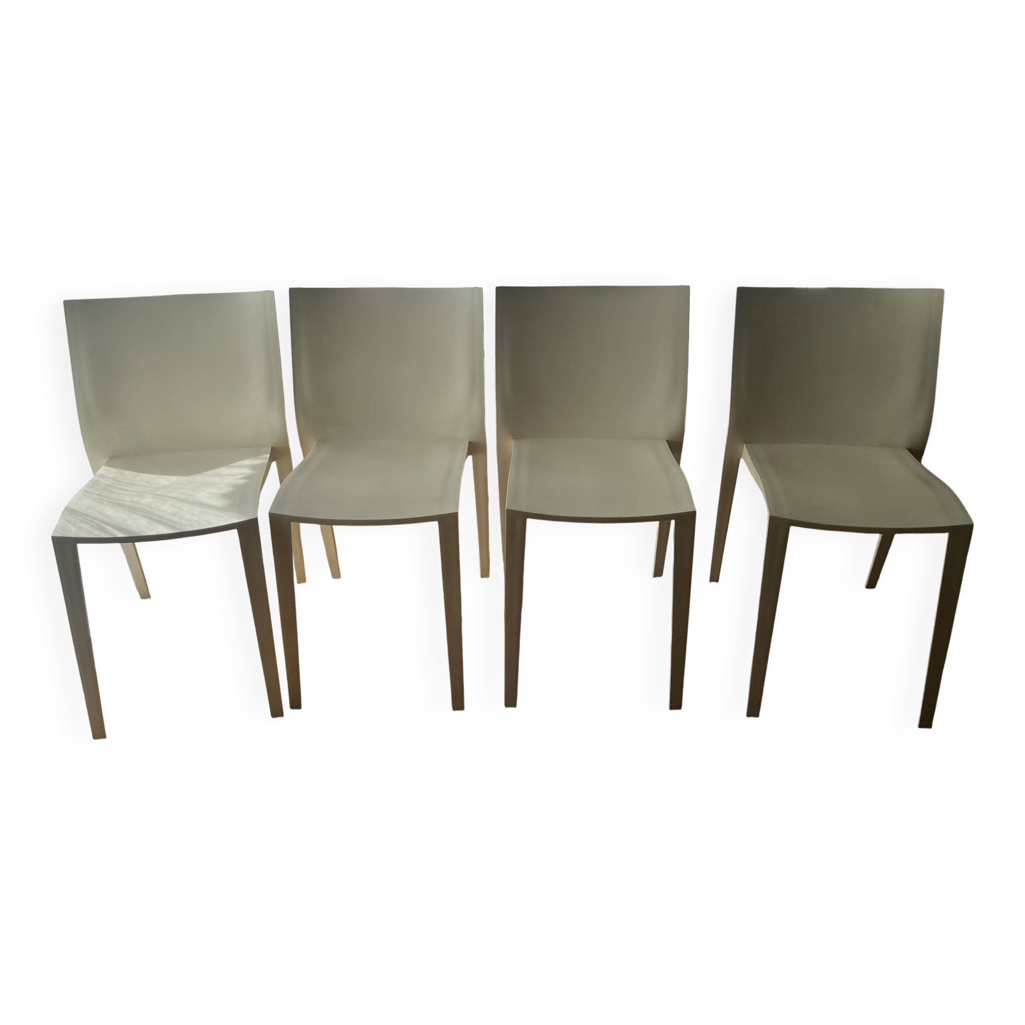 4 white Philippe Starck slick slick chairs