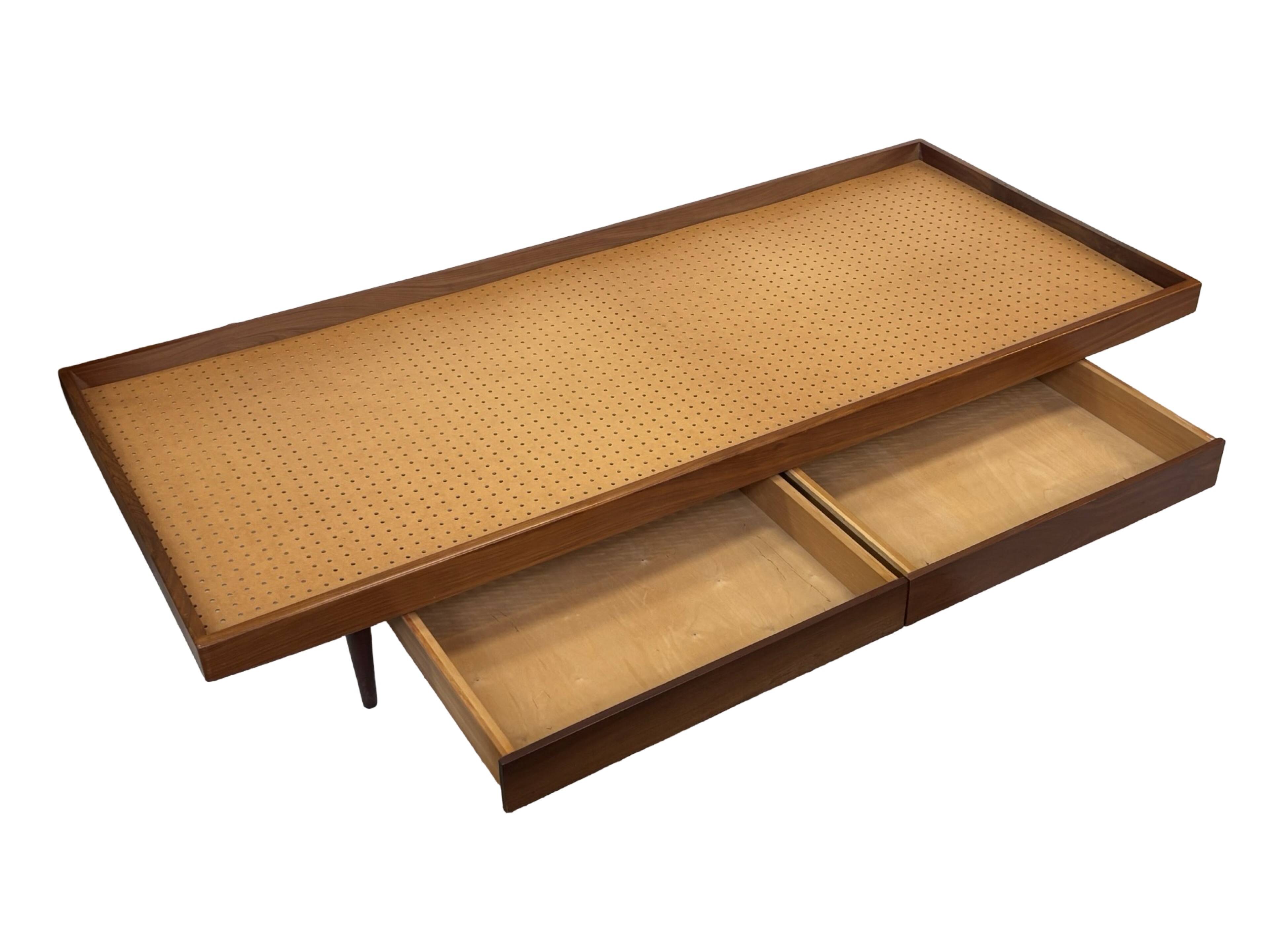 Vintage 1950s teak sofa bed with drawers.