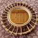 Miroir soleil en rotin vintage 70s