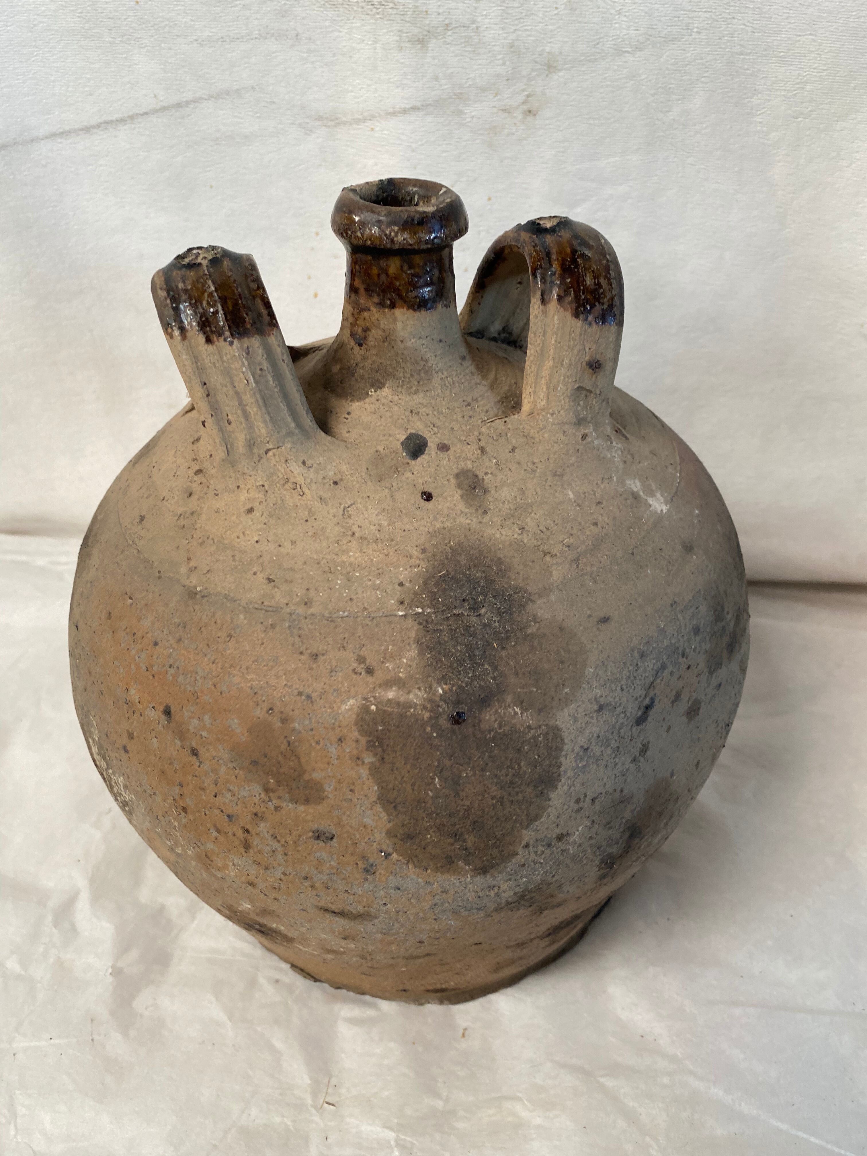 Vase jug in ancient sandstone