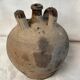 Vase jug in ancient sandstone