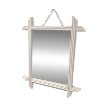 Antique mirror with wooden frame, crossbar mounting.