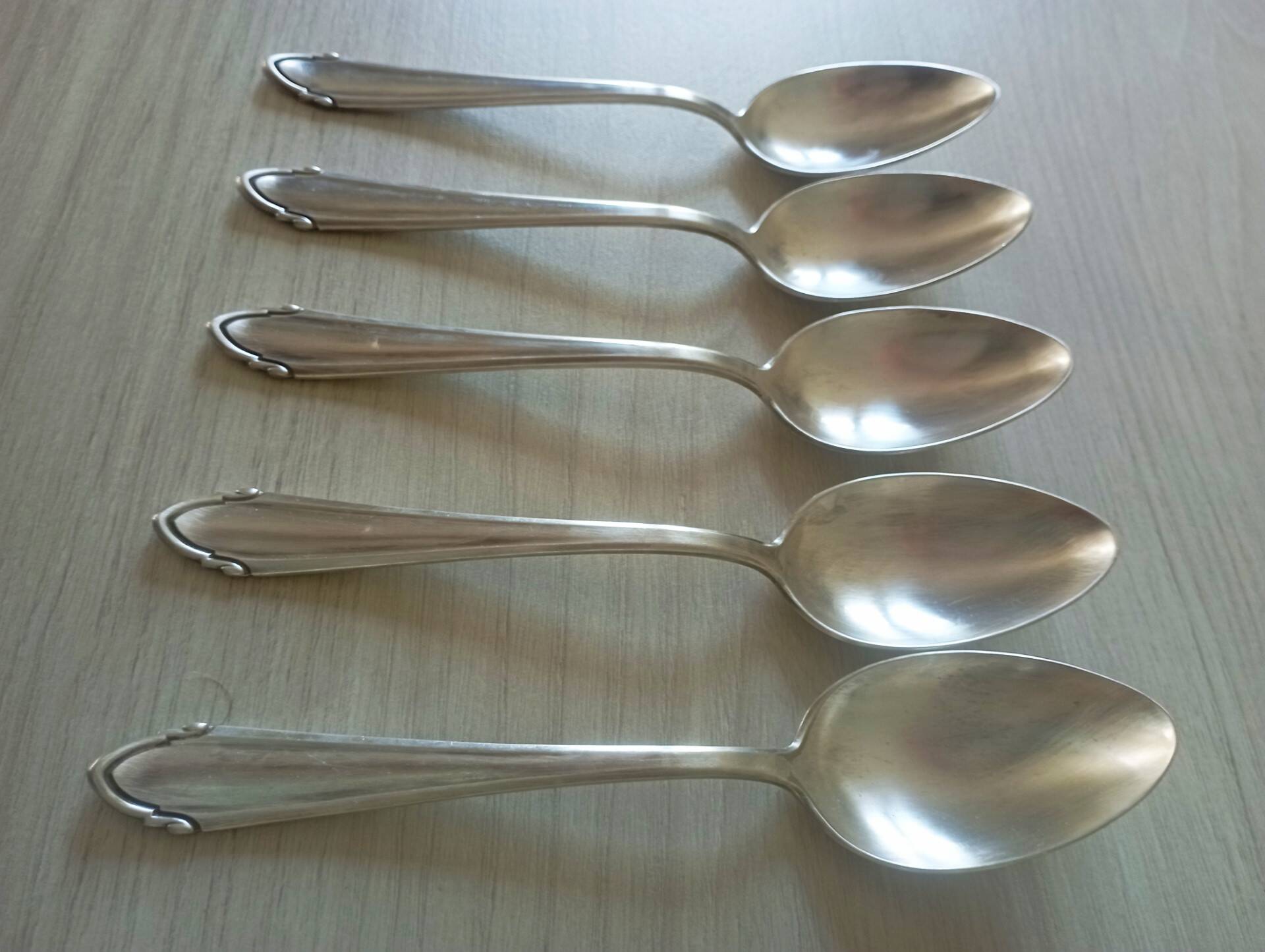 Set of 5 large silver metal spoons
