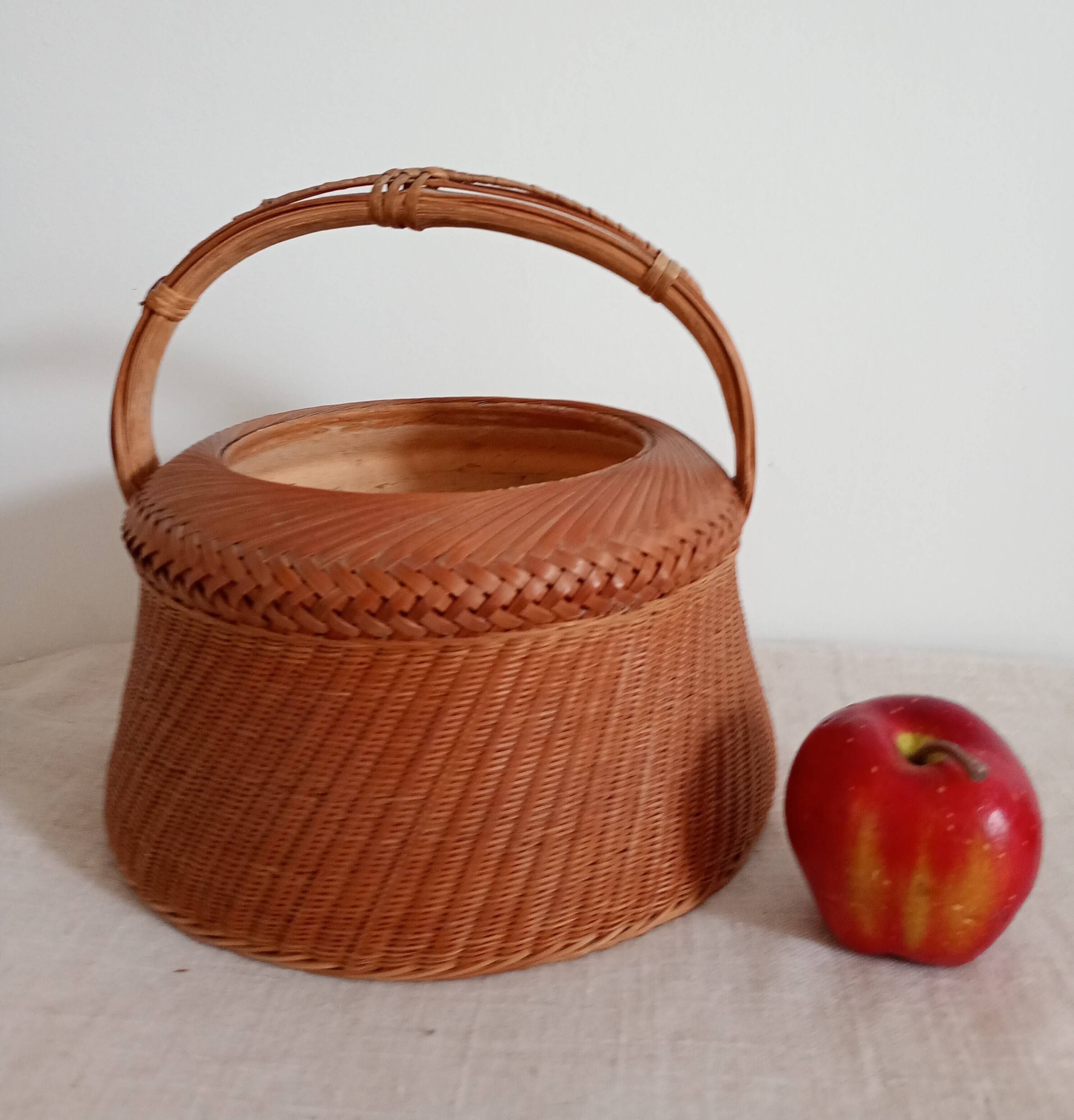 Woven bamboo basket and ceramic. Philippines.