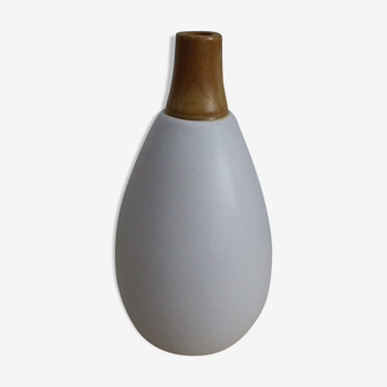 Ceramic vase and wood