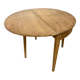 Table ronde pliante en noyer