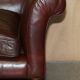 Vintage Art Deco leather sofa, three-seater, feather cushions.