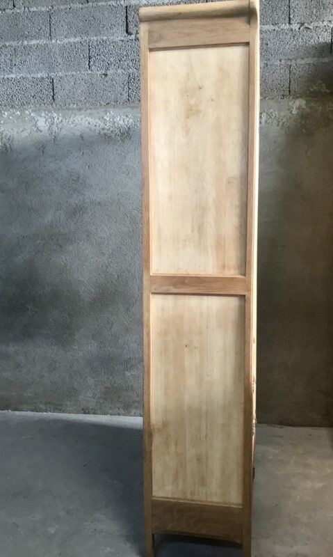 Raw wood hotel cabinet