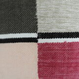 Housse de coussin tissé