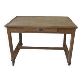 Vintage kitchen table on casters.