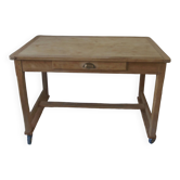 Vintage kitchen table on casters.