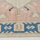 Tapis vintage en laine et coton pêche et bleu