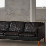 Three-seater canapé by Mogens Hansen, mid-century, in patinated black leather and solid beech.
