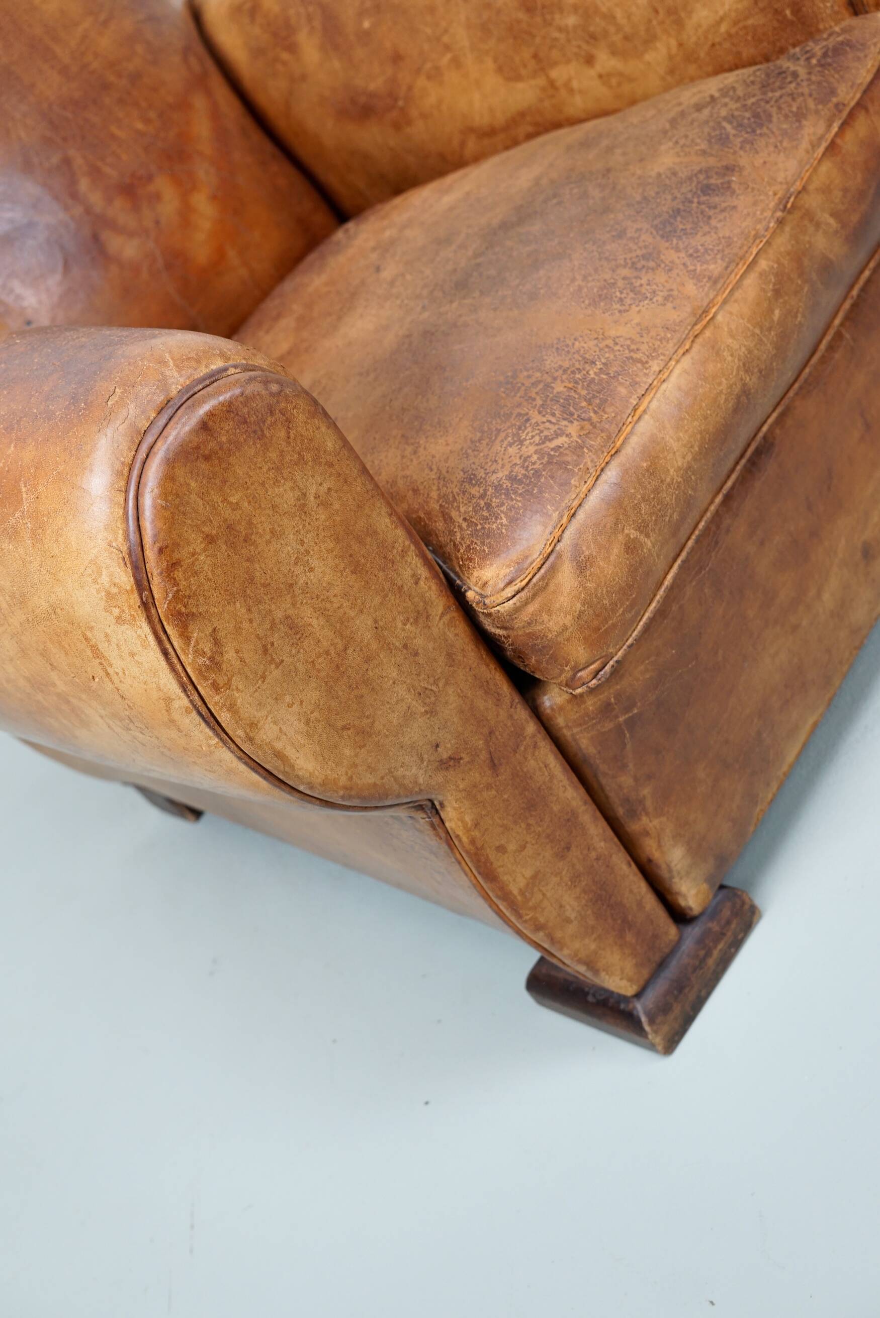 French moustache back cognac-colored leather club chair, 1940s