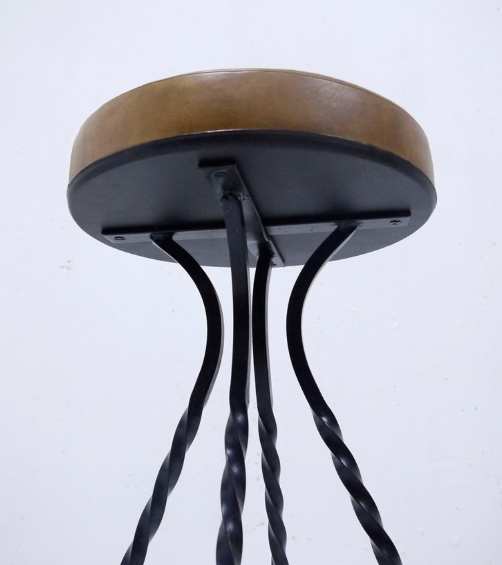 Footswith e.g. wrought iron feet and 60s vinyl seating