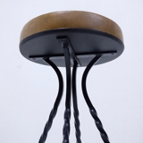 Footswith e.g. wrought iron feet and 60s vinyl seating