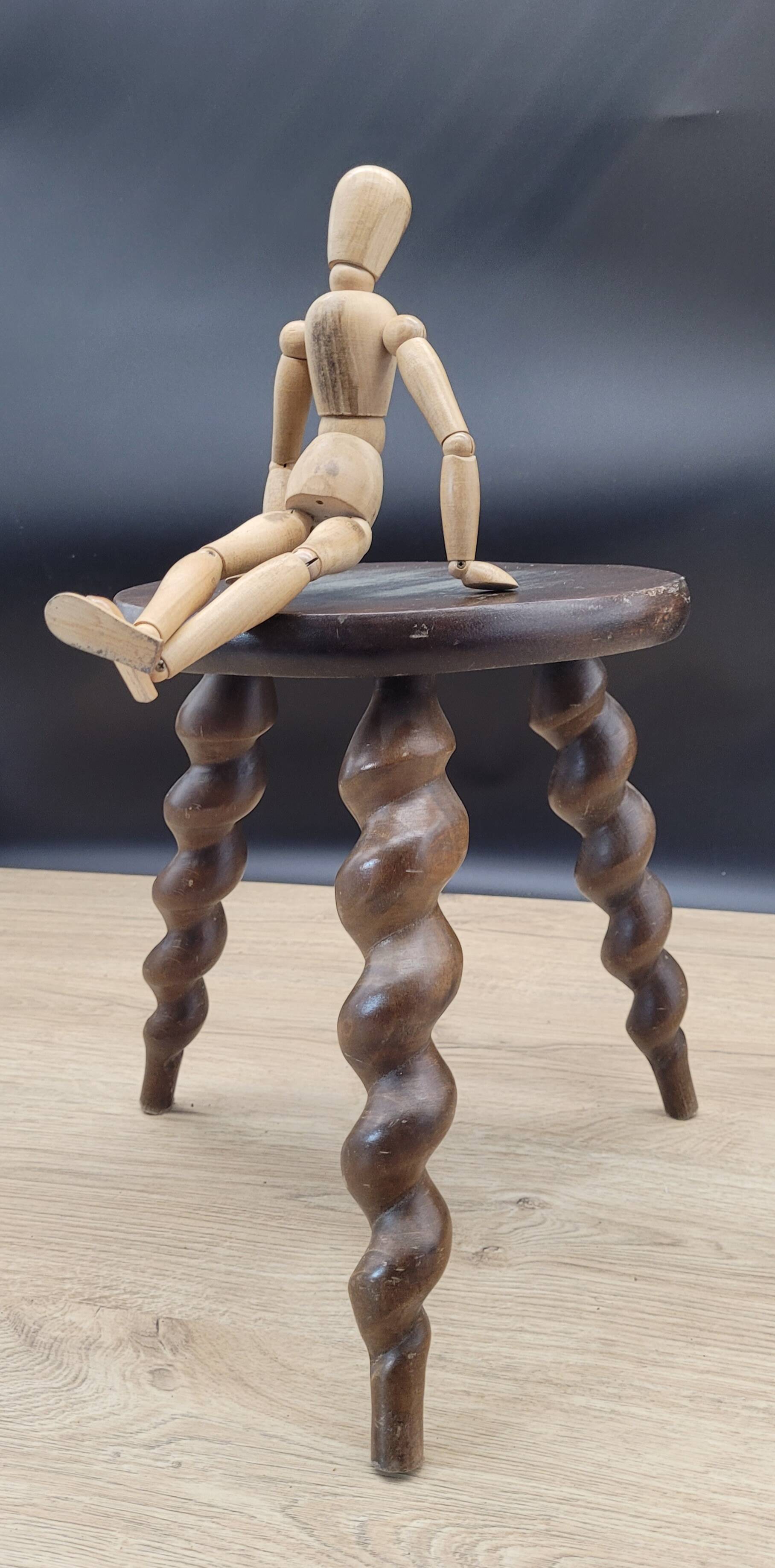 Tripod stool with turned legs