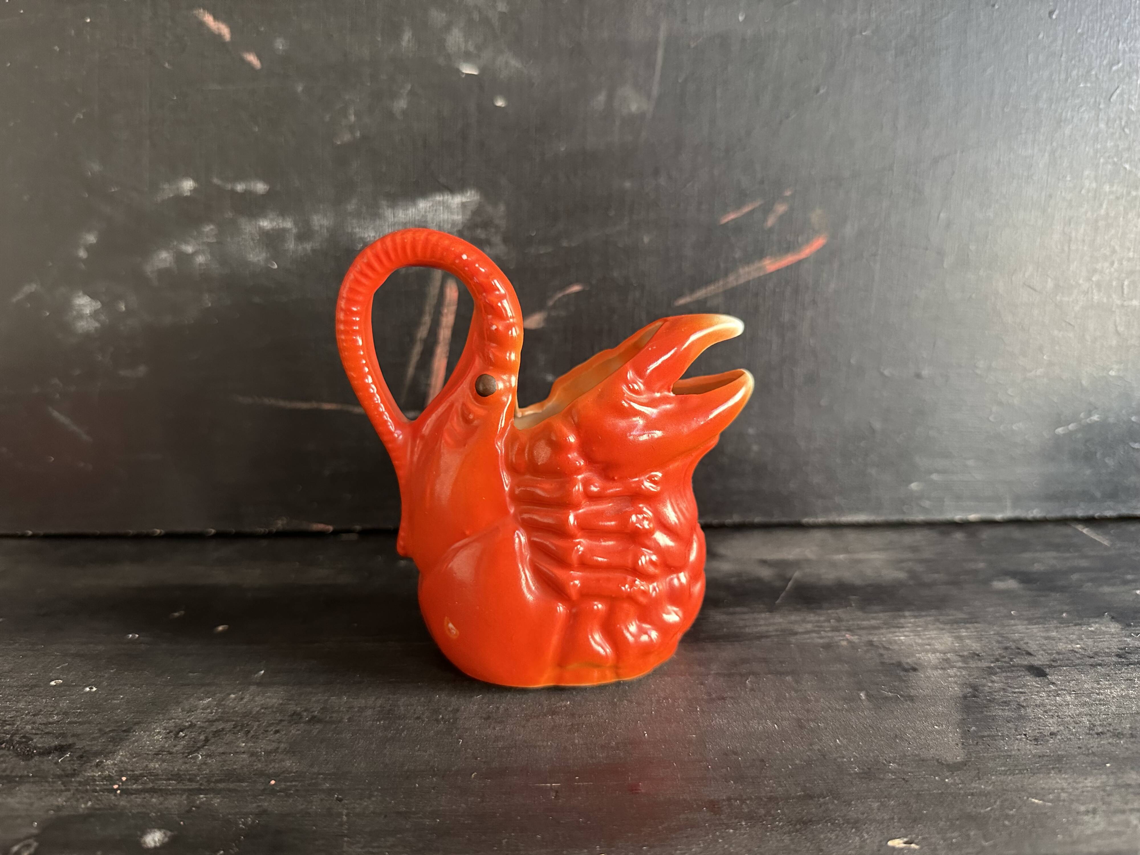 Antique ceramic lobster pitcher from the early 20th century.