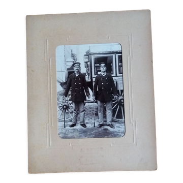 Old photograph from 1900 of two coachmen of the Western Railways by A. Rebut in Paris.