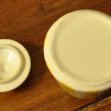 Yellow and white striped cover pot