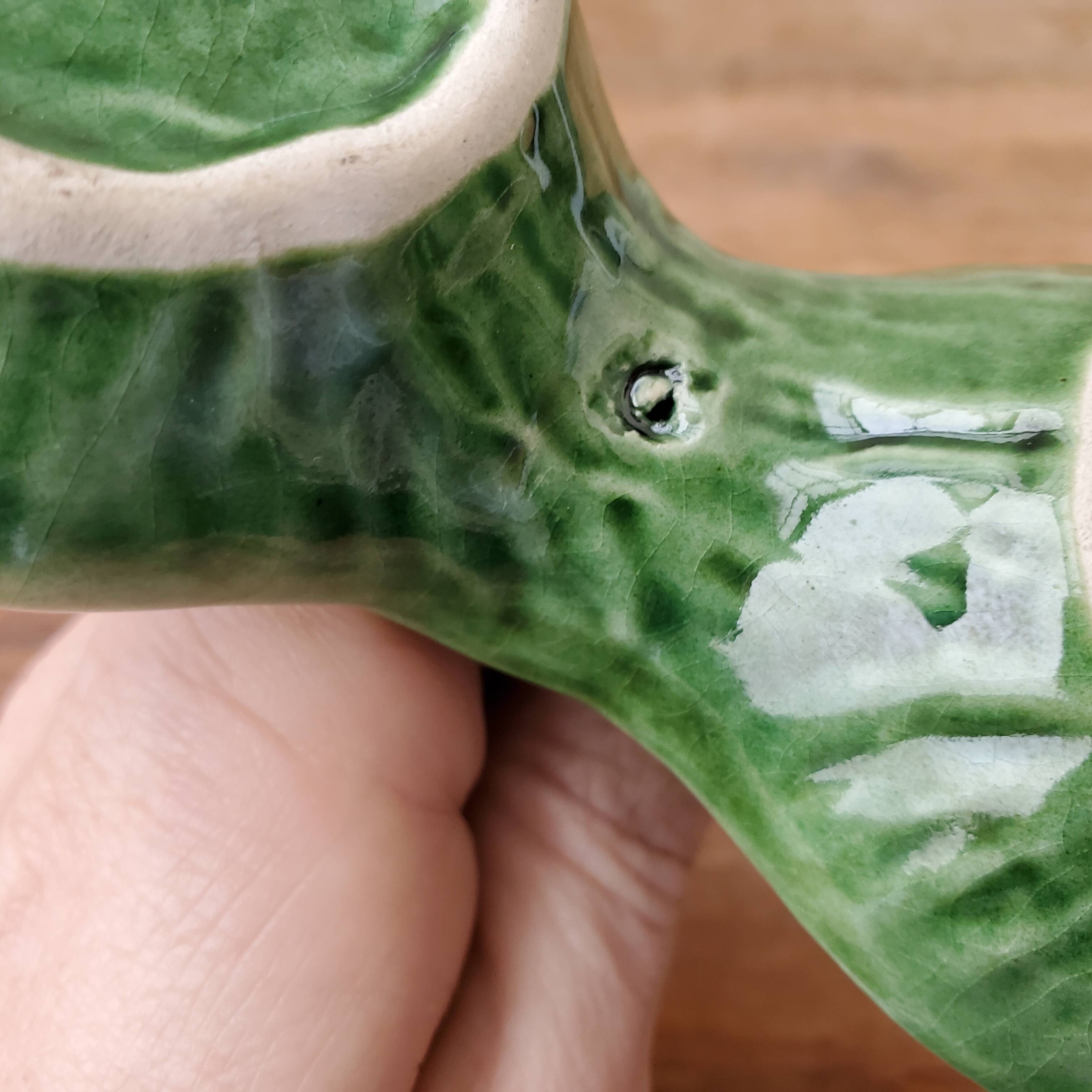 Green ceramic pepper shaker