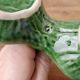 Green ceramic pepper shaker