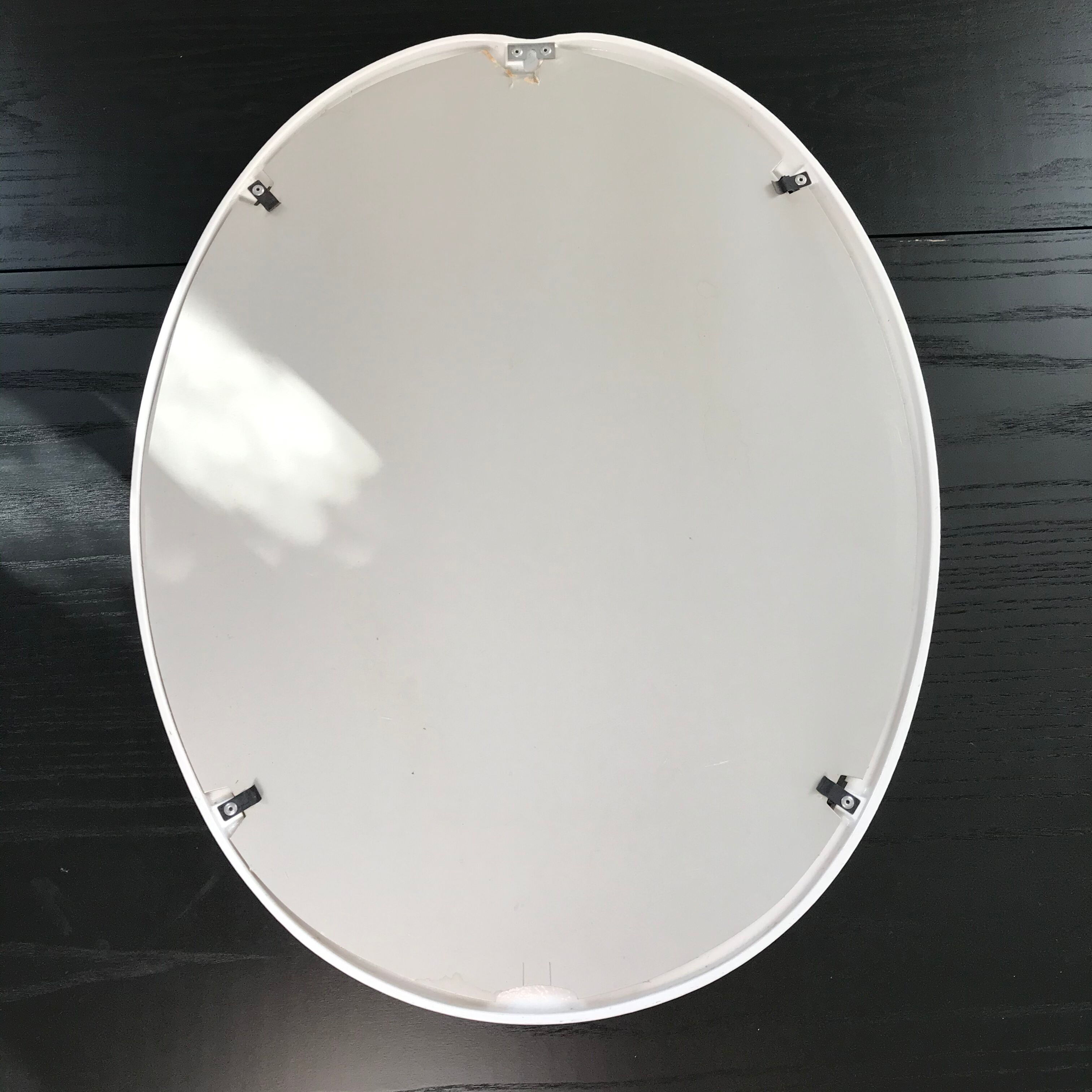White metal oval mirror 49x39cm