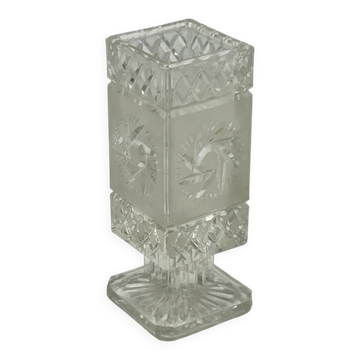 Vintage vase on a pedestal made of cut and frosted glass.