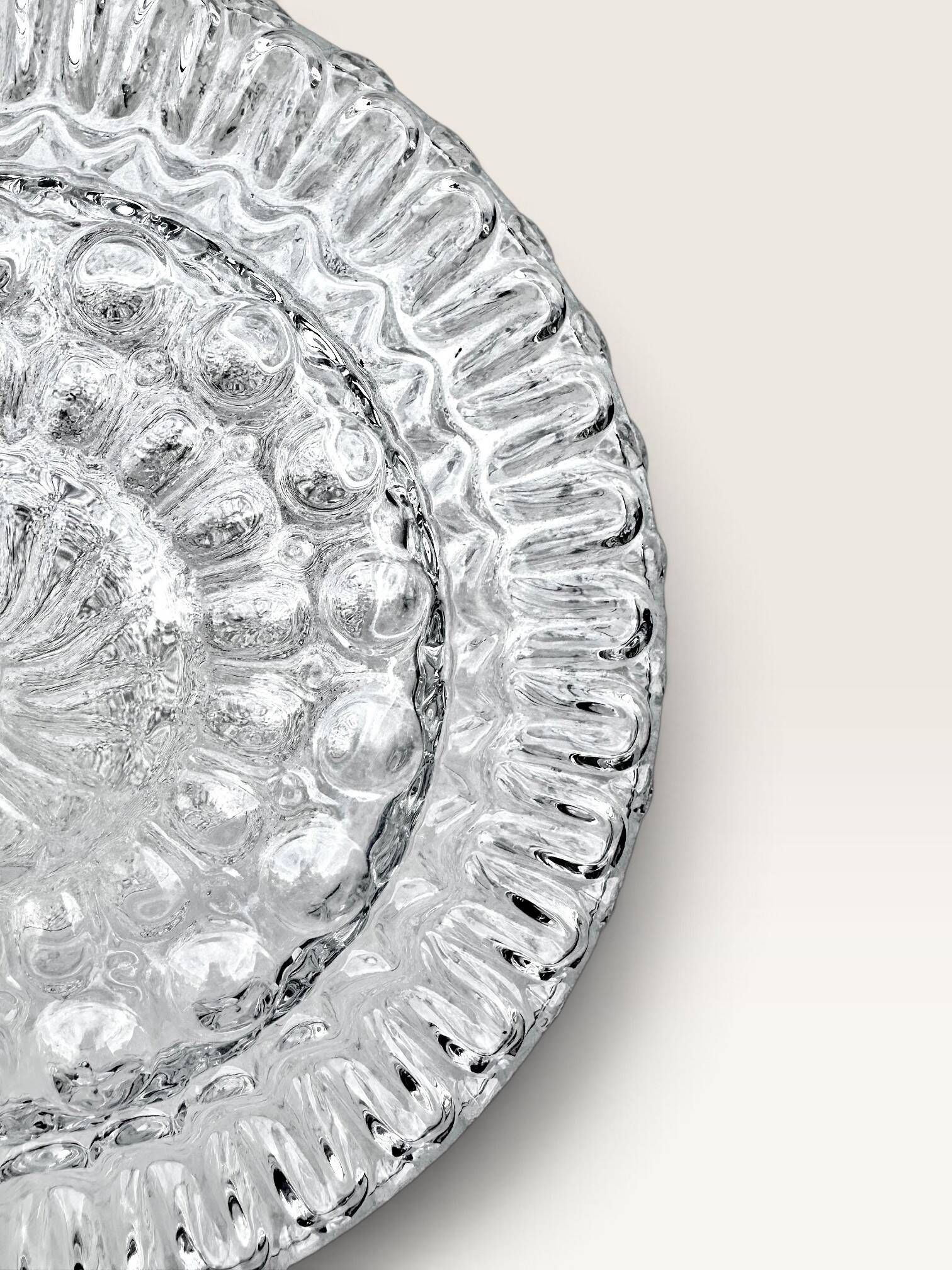 Set of three round wall/ceiling lights in moulded glass.
