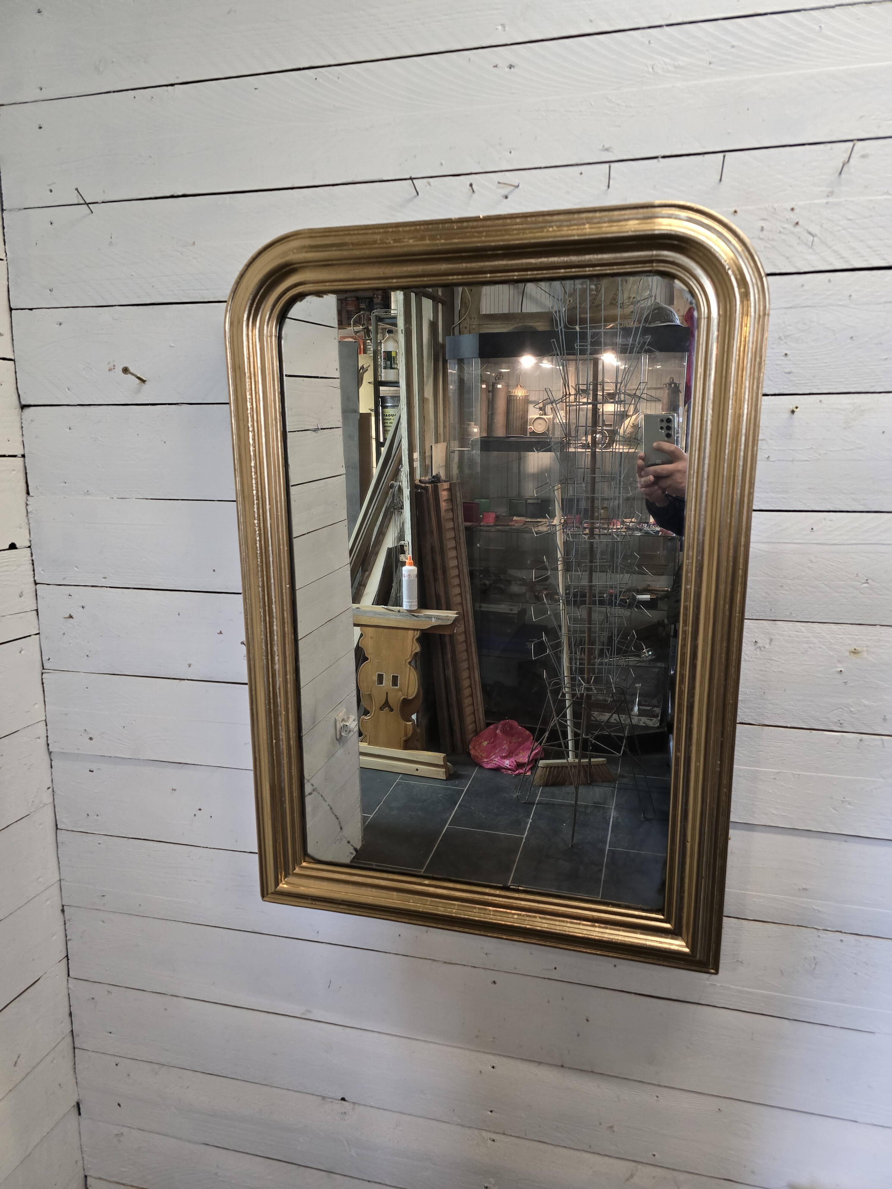 Old Louis Philippe style gilded mirror with mercury mirror