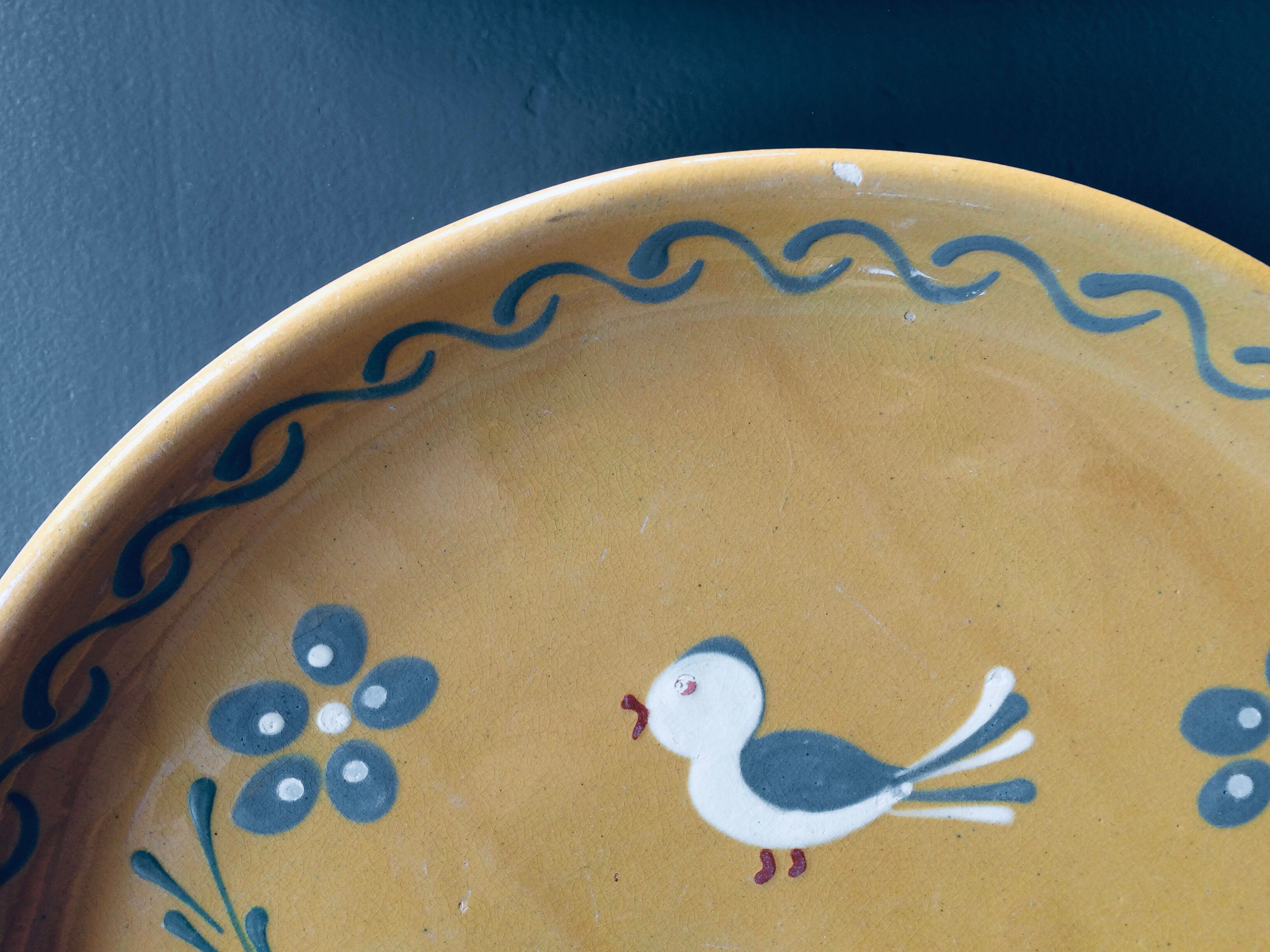 The six Piaf plates in painted terracotta