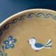 The six Piaf plates in painted terracotta