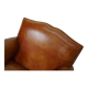 Vintage french moustache back cognac-colored leather club chair