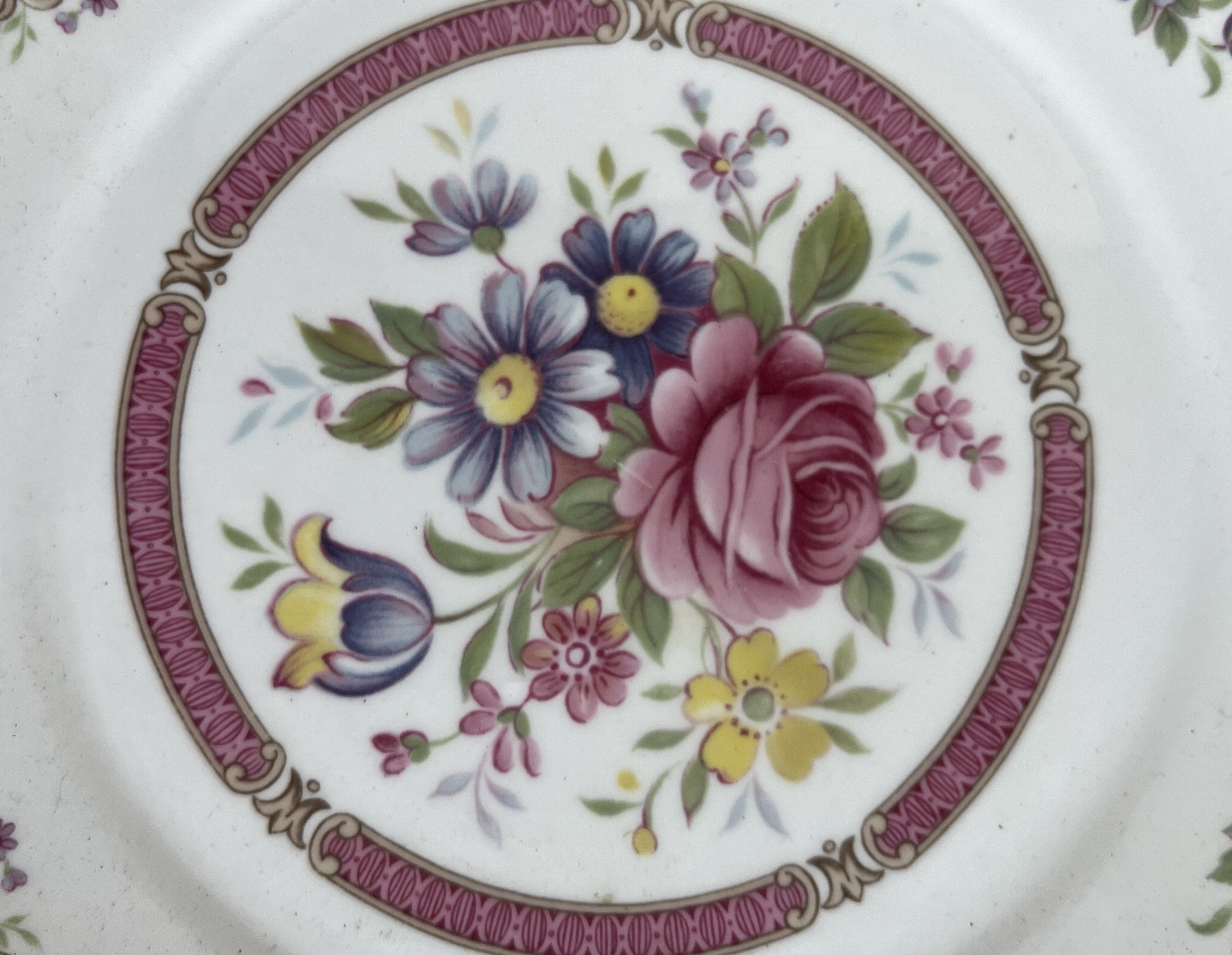 10 porcelain plates and a dish