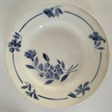 Set of 8 ironstone plates with coordinated designs.