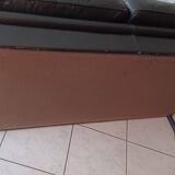 Black leather two-seater sofa