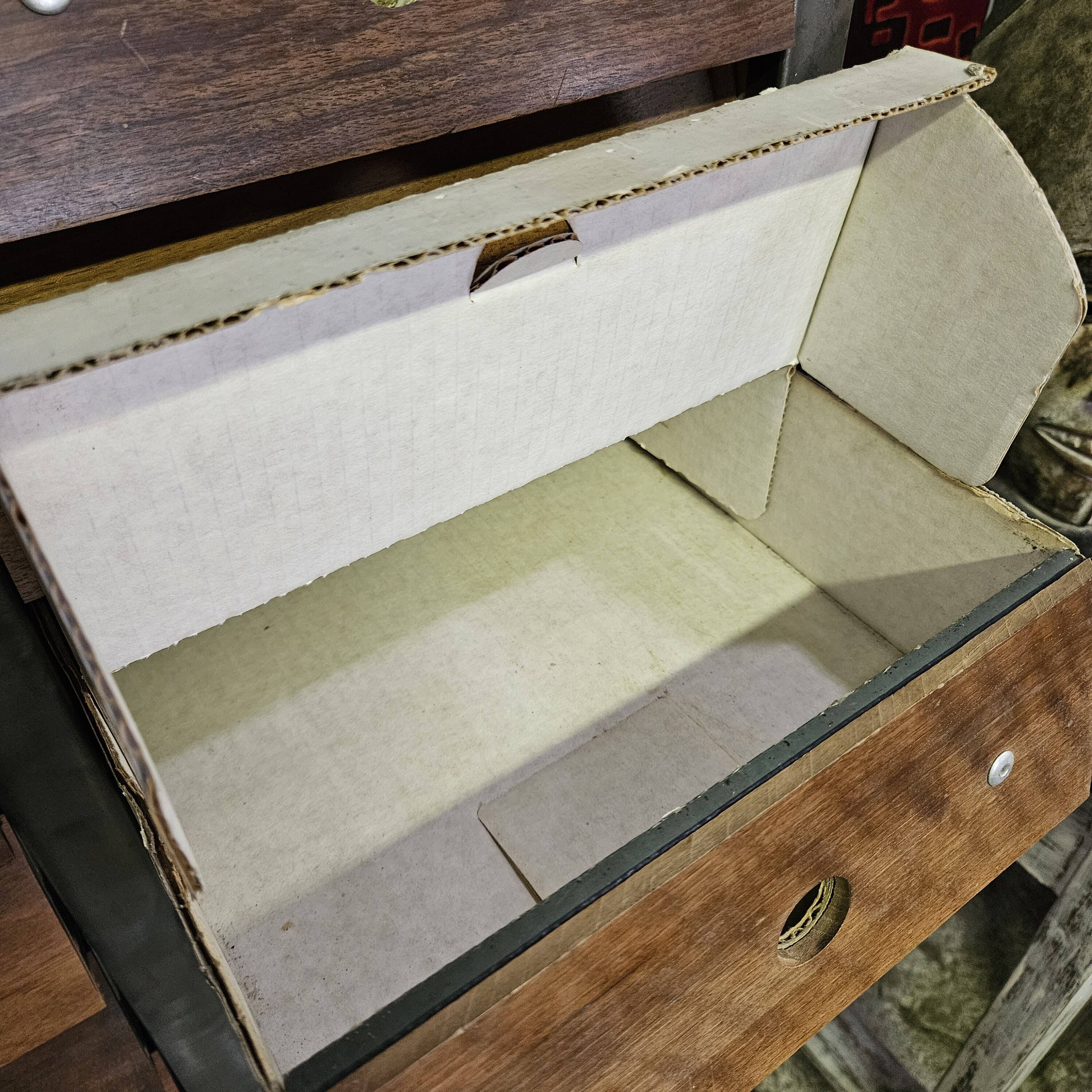 Clem industrial cabinet with 60 A4-sized drawers and riveted walnut fronts