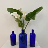 Trio of apothecary bottles in cobalt blue glass
