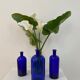 Trio of apothecary bottles in cobalt blue glass