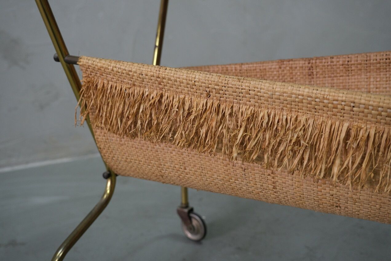 Mid-century teak and brass mobile side table with magazine holder, 1960s